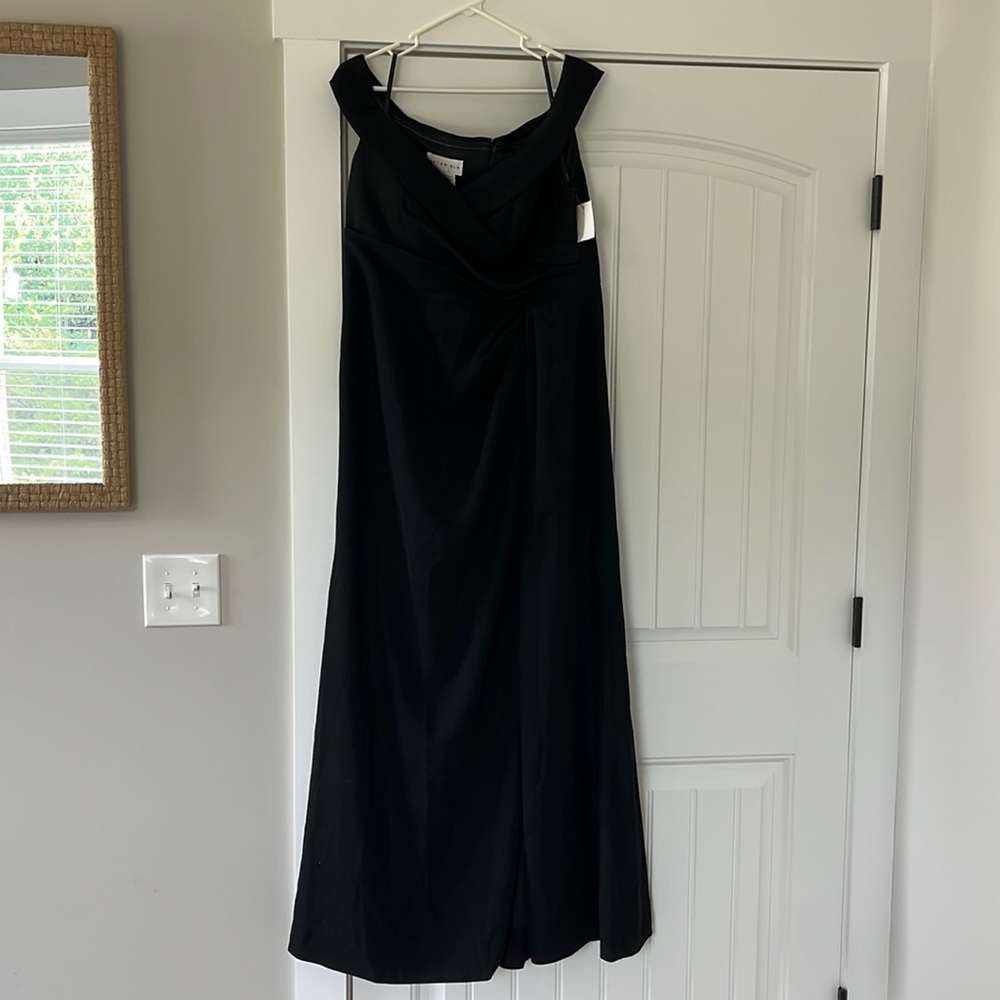 After Six formal black dress. Off the shoulders with slit